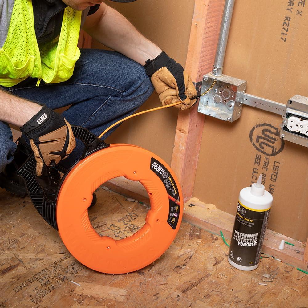 imageKlein Tools 56351 NonConductive Electrical Fish Tape Fiberglass Wire Puller wSteel Leader Optimized Housing 100Foot x 316InchFiberglass