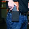 imageKlein Tools 55461 Phone Holder Large Fits iPhone Google LG Samsung Phones With Magnetic Closure and Belt ClipXXLarge