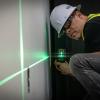 imageKlein Tools 93LCLG Laser Level Self Leveling HiViz Green Cross Line Level with Red Plumb Spot and Magnetic Mounting Clamp
