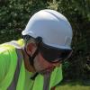 imageKlein Tools Safety Helmet Vented Class C Safety Hard Hat Removable Chin Strap Adjustable VentsWhite Hardhat with Gray Visor