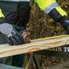 imageKlein Tools Winter Work Gloves Knit Dipped ANSI A4 CutResistant Sandy Latex Coated FleeceLined Touchscreen CapableXlarge